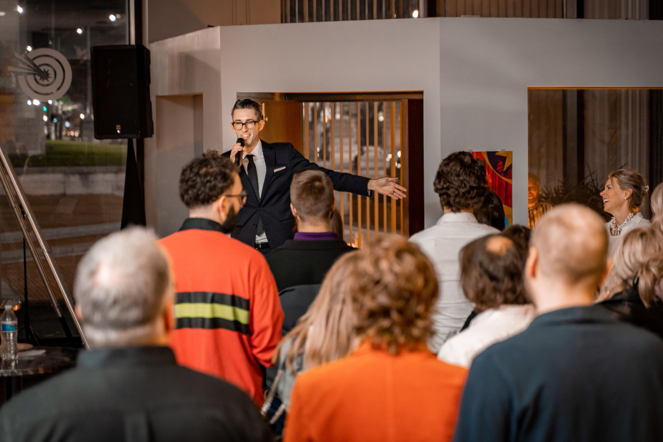 Mattew Sliver speaking to the party guests