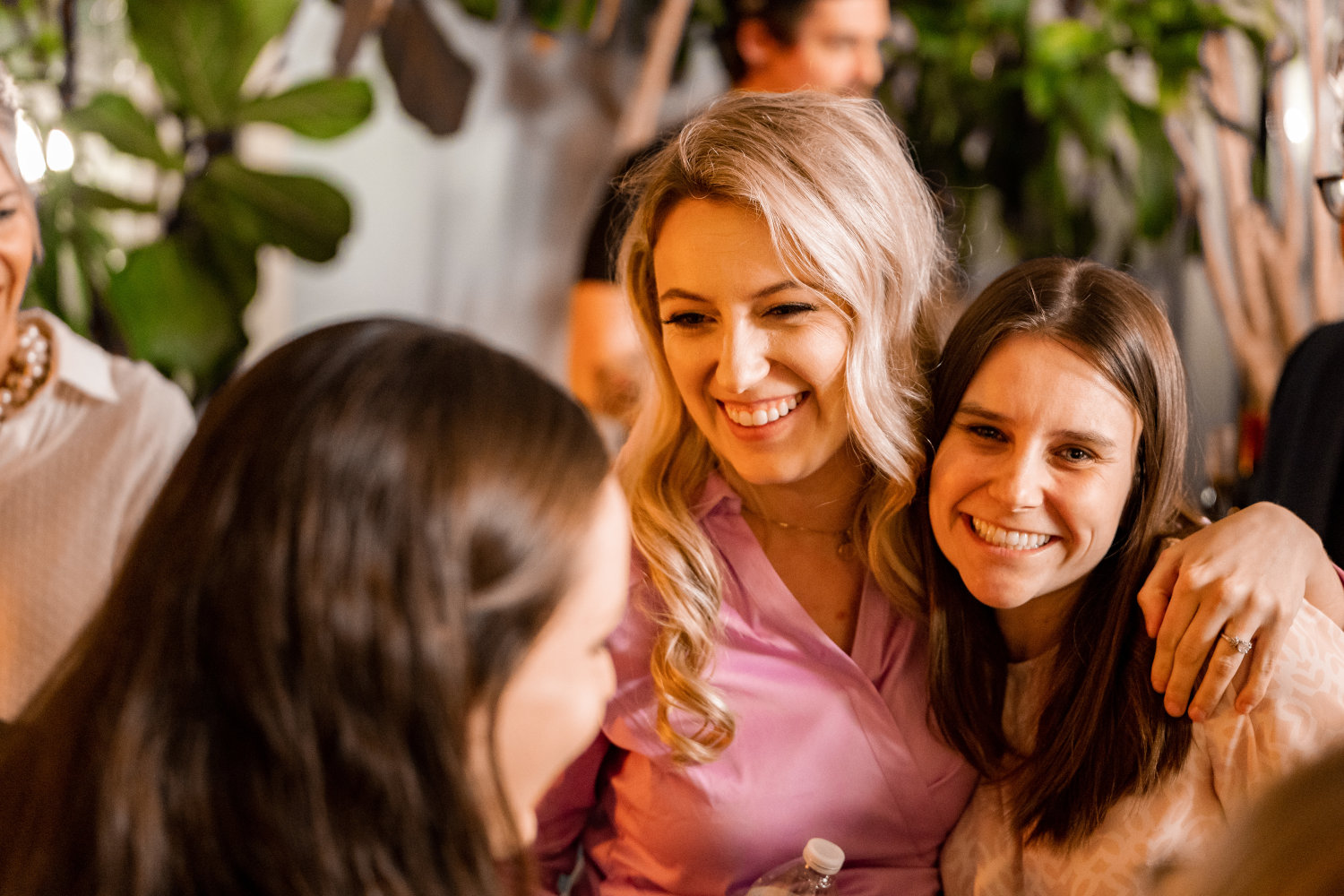 Raichel Huber talking with party Guests